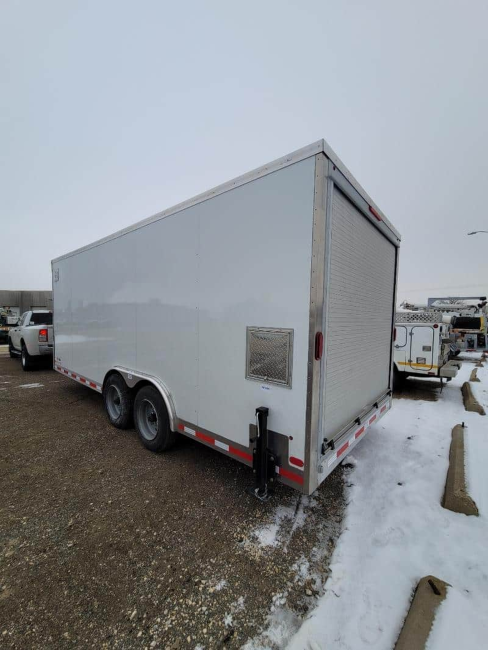 A trailer hooked to a truck 