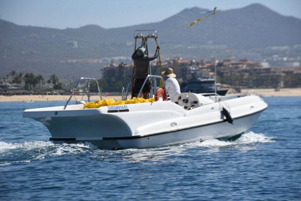 a boat with a statue on the front