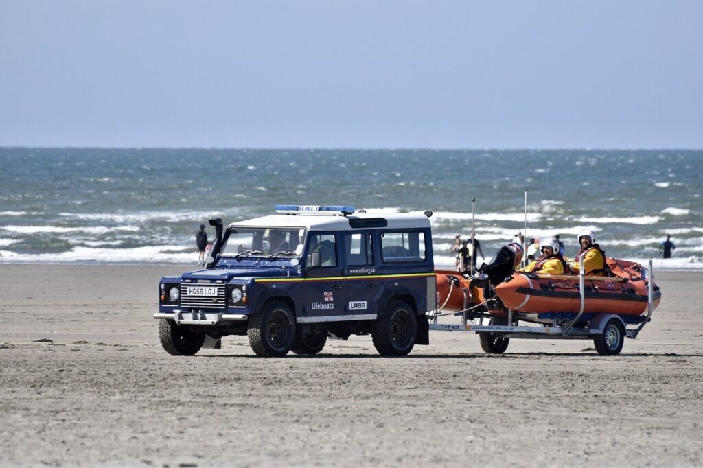 beach, rescue, sea, sand, lifeboat, boat, waves, nature, land rover, trailer