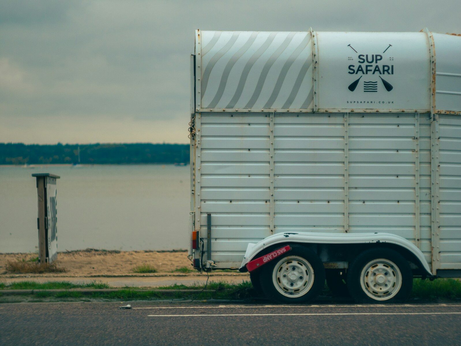 a semi truck parked on the side of the road